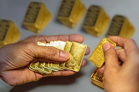 Báo cáo việc làm của Mỹ có thể ngăn đà tăng kỷ lục của giá vàng